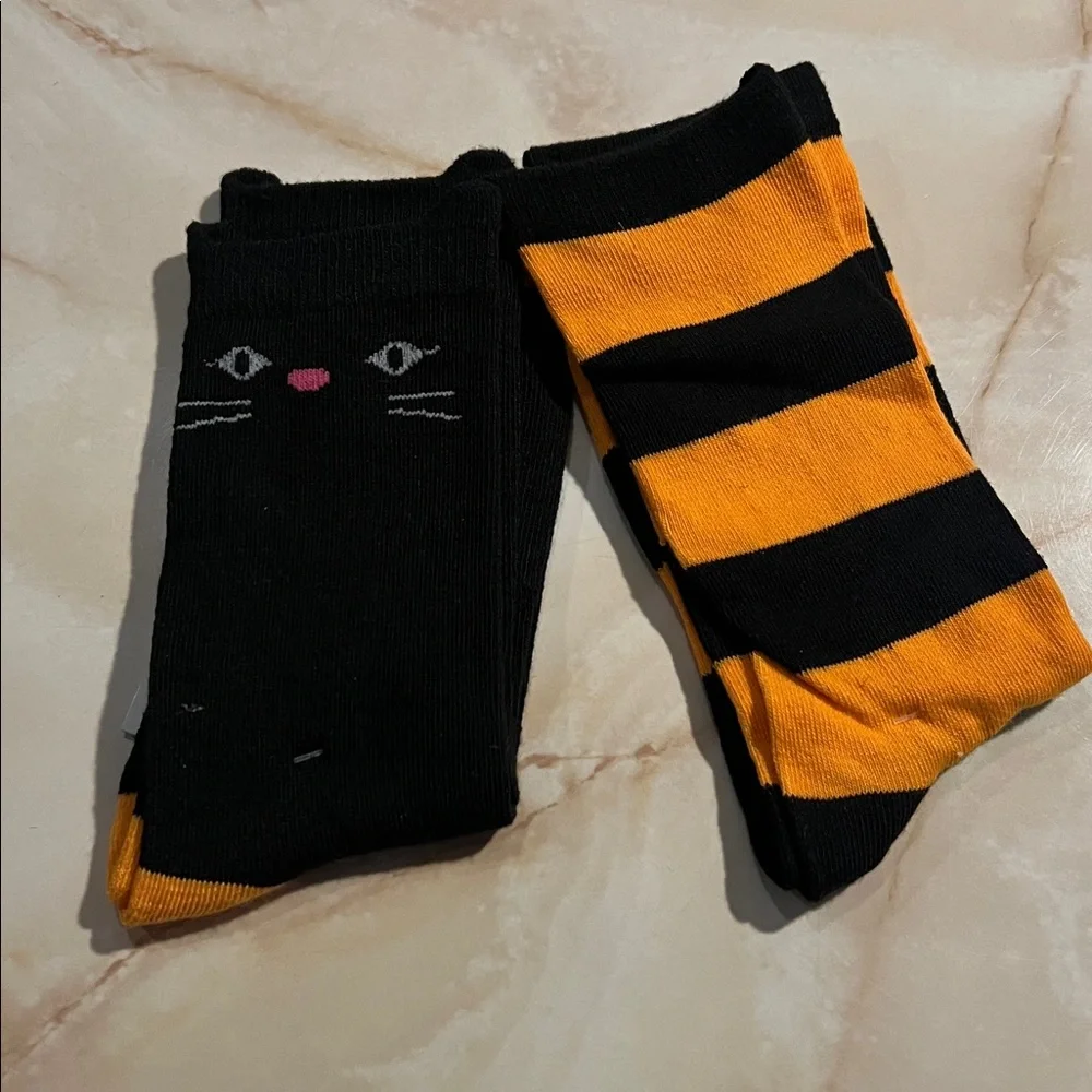 NWT  2pc Men’s & Women black and orange Halloween sock set